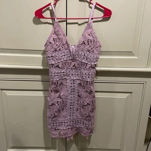 Purple lace mini dress with low neckline